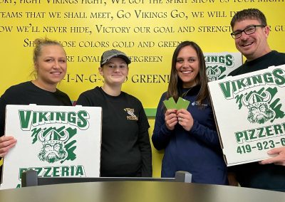 Photo of Vikings Pizzeria Employees holding gift cards